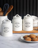 Load image into Gallery viewer, Country Cottage Home Canister Set of Three Sugar, Tea and Coffee