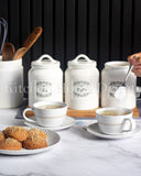 Load image into Gallery viewer, Country Cottage Home Canister Set of Three Sugar, Tea and Coffee