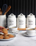 Load image into Gallery viewer, Country Cottage Home Canister Set of Three Sugar, Tea and Coffee