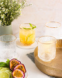 Load image into Gallery viewer, Art Deco Rainbow Embossed Low-Ball Glasses with Gold Rim - Set of 4