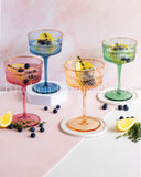 Load image into Gallery viewer, Classic Multi-Colored Coupe Champagne Glasses Set of 4 with Gold Rim