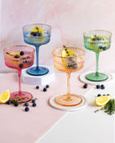 Load image into Gallery viewer, Classic Multi-Colored Coupe Champagne Glasses Set of 4 with Gold Rim